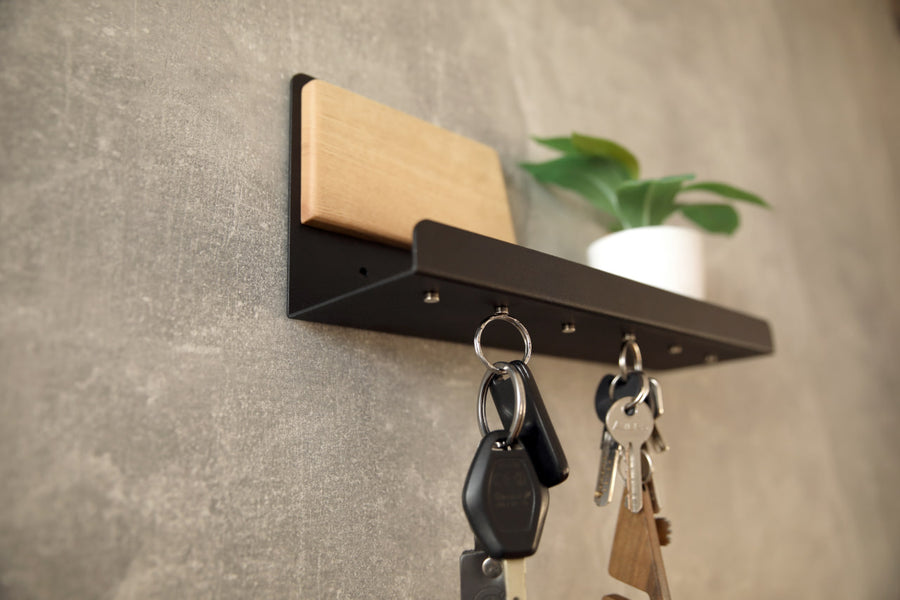 Modern-wall-mounted-magnetic-key-holder-with-metal-shelf-and-wooden-accent-Features-strong-magnets-for-securely-holding-keys-and-small-items-Ideal-for-home-or-office-organization