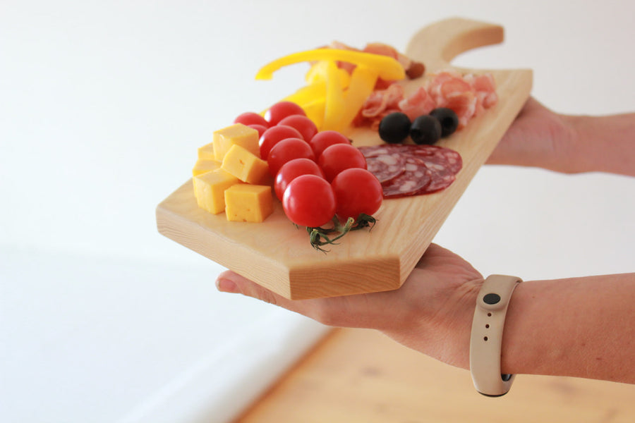 Handcrafted-wooden-charcuterie-board-with-handle