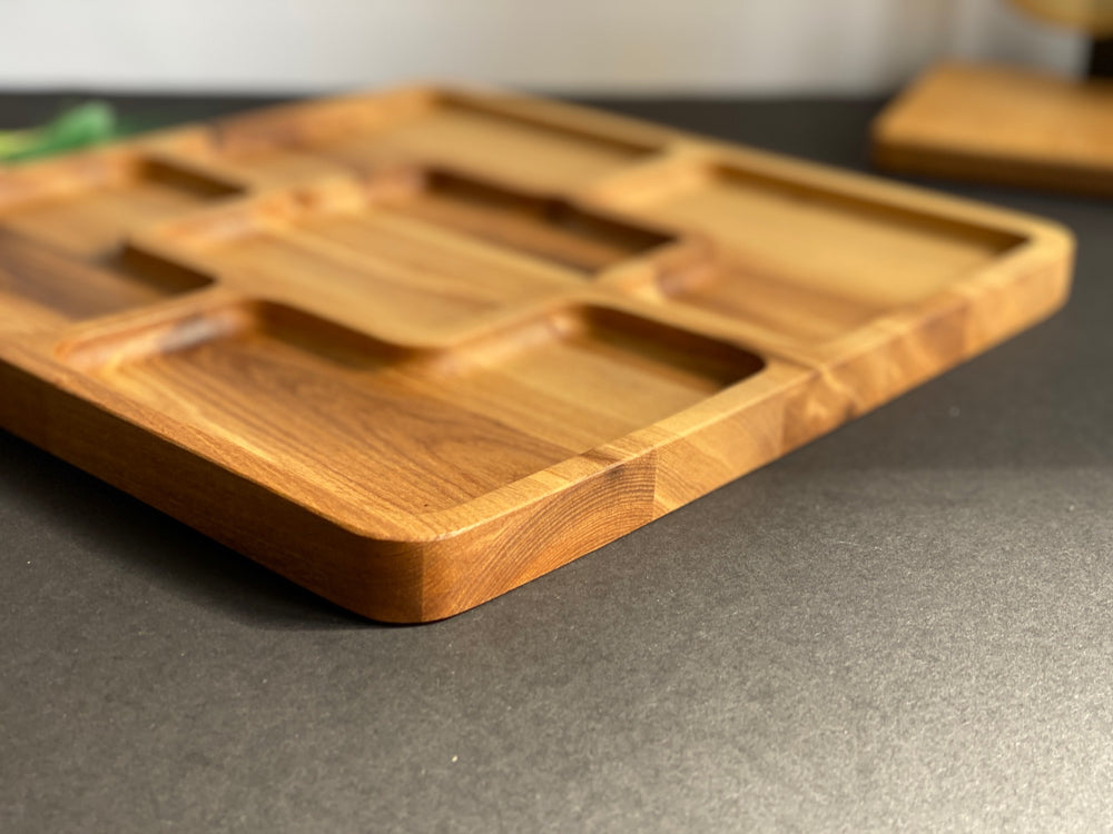 Rustic-wooden-appetizer-tray-with-multiple-sections-perfect-for-cheese-bread-fruits-and-dips