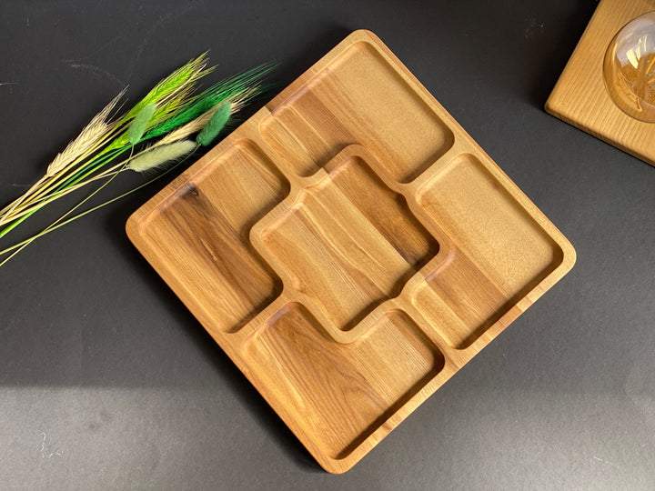 Rustic-wooden-appetizer-tray-with-multiple-sections-perfect-for-cheese-bread-fruits-and-dips