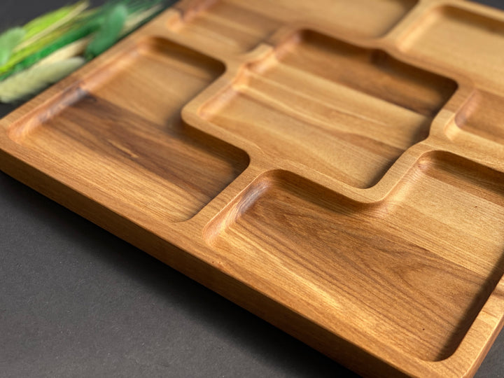 Rustic-wooden-appetizer-tray-with-multiple-sections-perfect-for-cheese-bread-fruits-and-dips