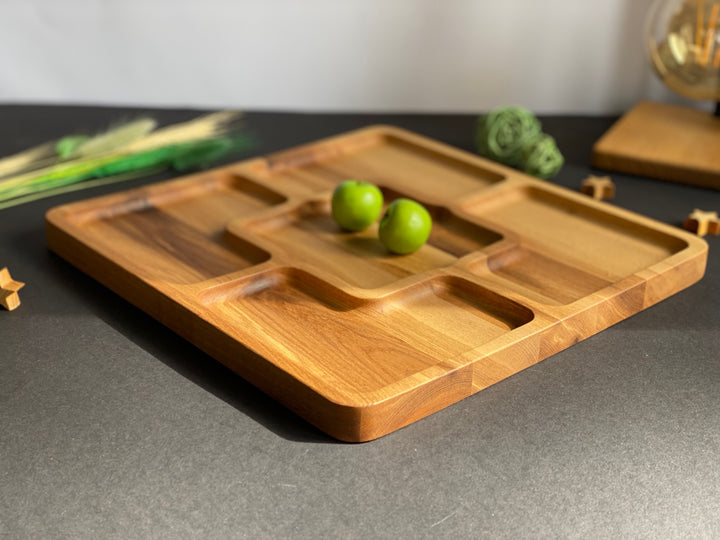Rustic-wooden-appetizer-tray-with-multiple-sections-perfect-for-cheese-bread-fruits-and-dips