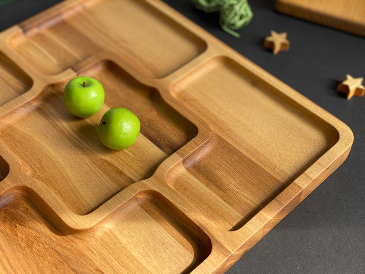 Rustic-wooden-appetizer-tray-with-multiple-sections-perfect-for-cheese-bread-fruits-and-dips
