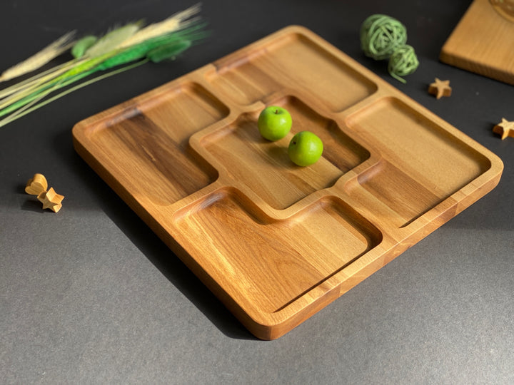 Rustic-wooden-appetizer-tray-with-multiple-sections-perfect-for-cheese-bread-fruits-and-dips