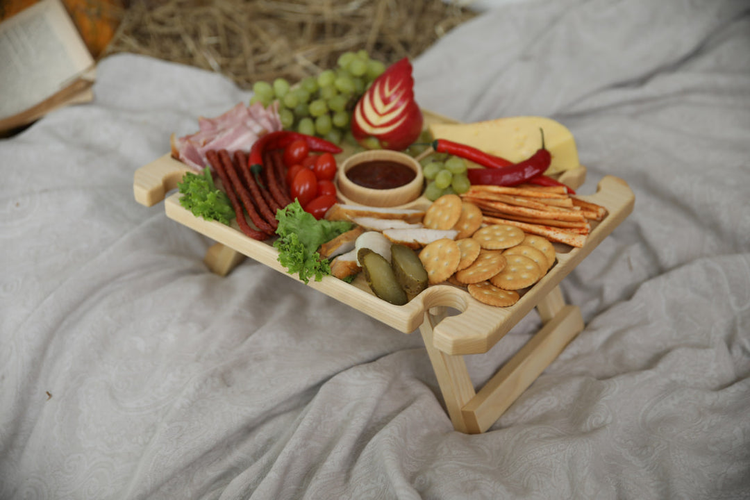 Wine-and-cheese-picnic-table-made-of-wood
