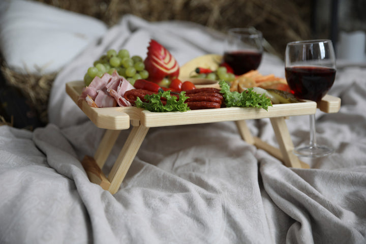 Wine-and-cheese-picnic-table-made-of-wood