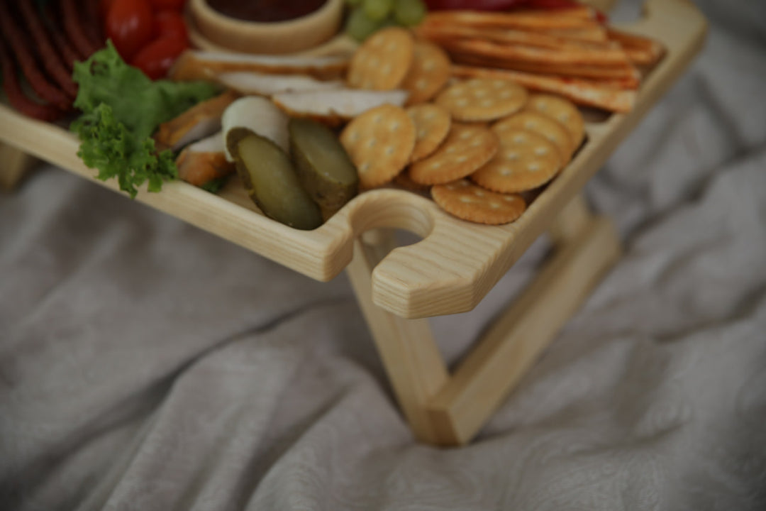 Wine-and-cheese-picnic-table-made-of-wood