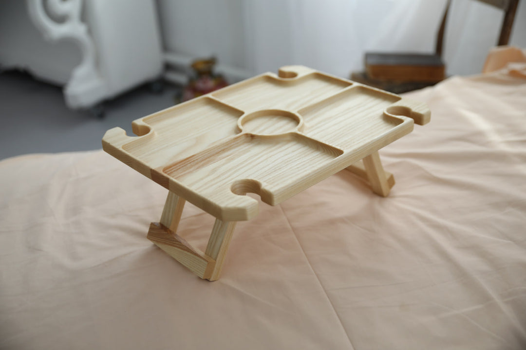 Wine-and-cheese-picnic-table-made-of-wood