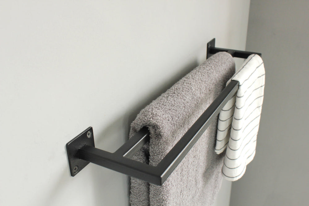 towel-rack-with-multiple-bars-for-hanging-towels-sturdy-metal-frame