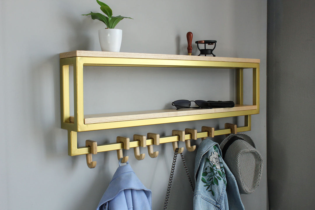 Space-saving-wall-mounted-hanger-with-shelf-and-multiple-hooks-for-coats