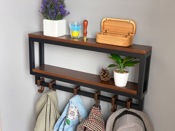 Space-saving-wall-mounted-hanger-with-shelf-and-multiple-hooks-for-coats