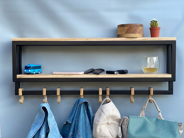 Space-saving-wall-mounted-hanger-with-shelf-and-multiple-hooks-for-coats