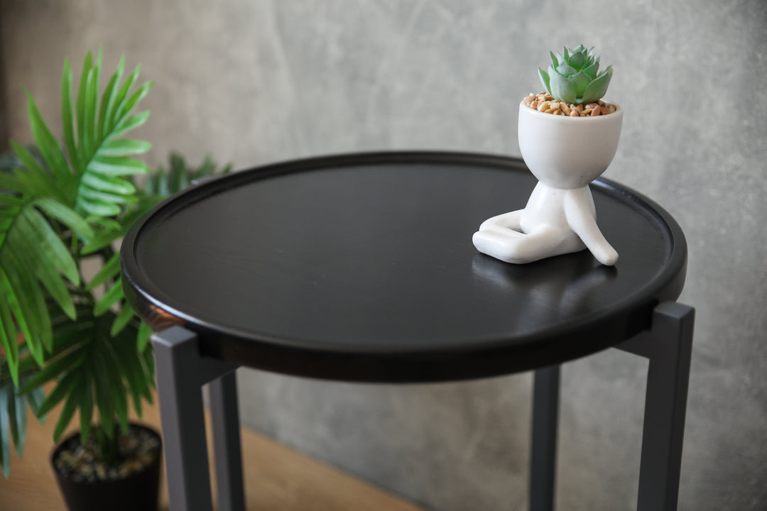 coffee-table with-a-natural-wood-top-and-black-metal-legs-perfect-for-modern-interiors