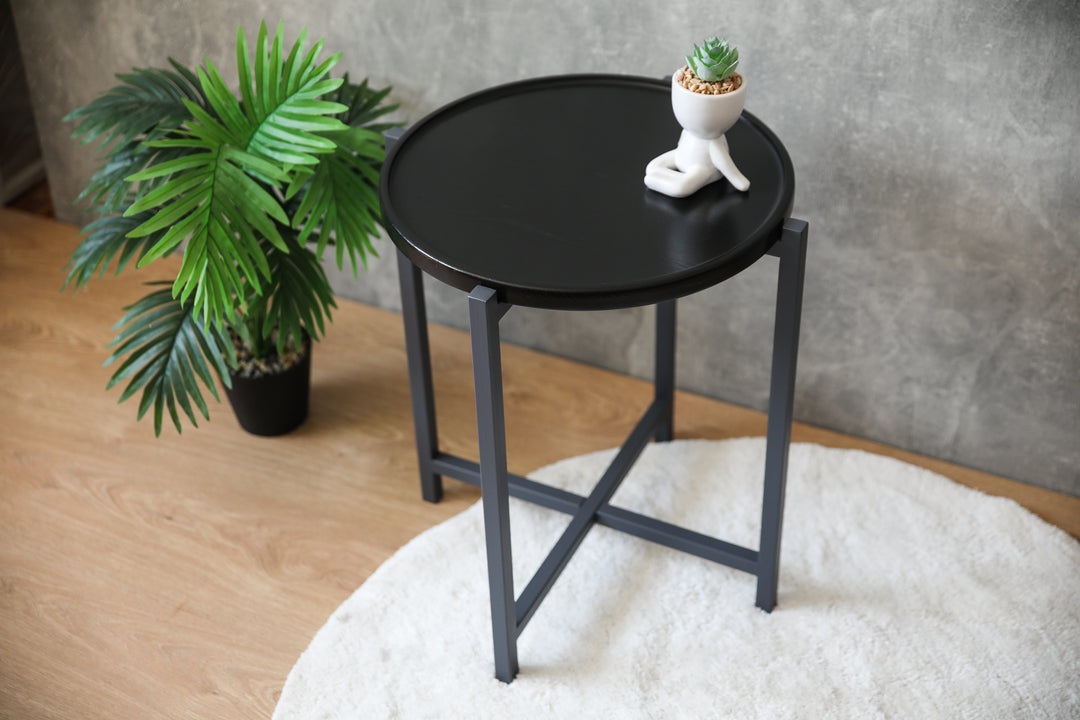 coffee-table with-a-natural-wood-top-and-black-metal-legs-perfect-for-modern-interiors