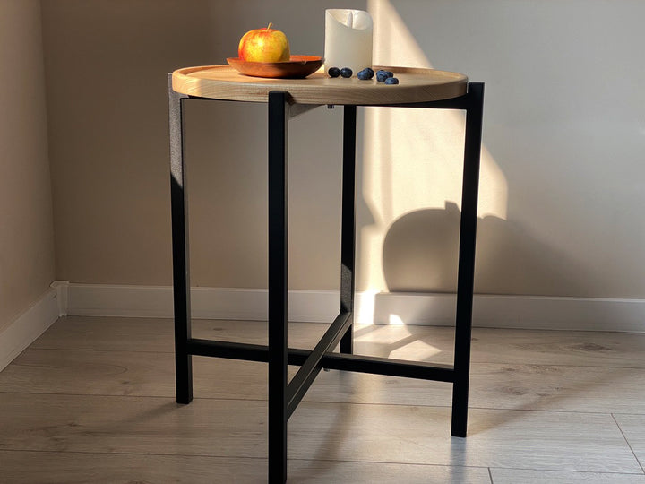 coffee-table with-a-natural-wood-top-and-black-metal-legs-perfect-for-modern-interiors