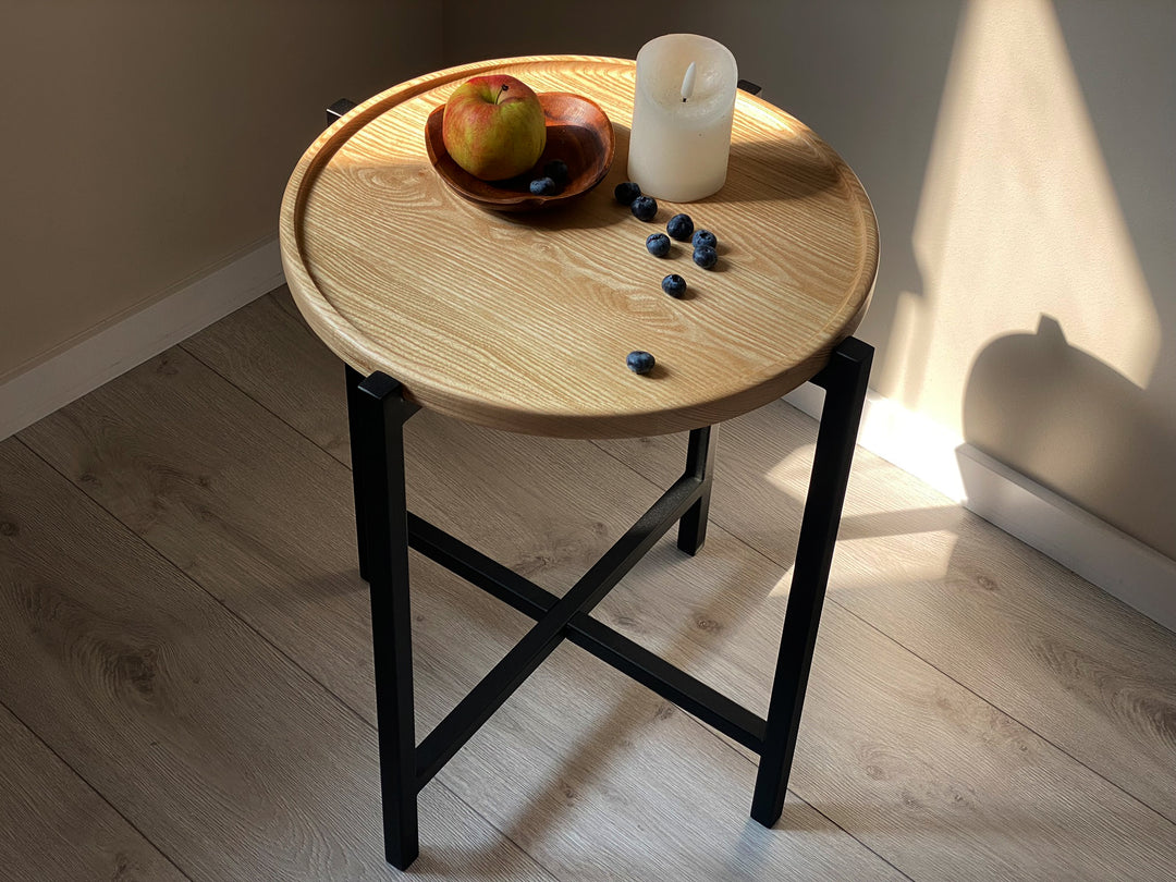 coffee-table with-a-natural-wood-top-and-black-metal-legs-perfect-for-modern-interiors