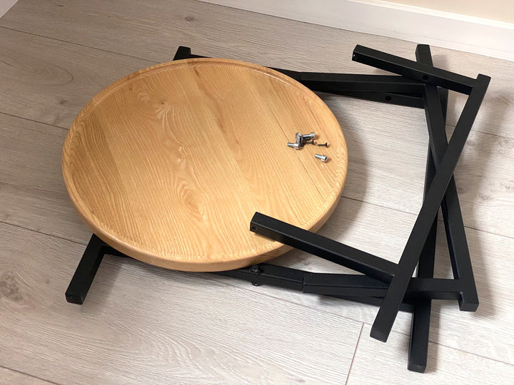 coffee-table with-a-natural-wood-top-and-black-metal-legs-perfect-for-modern-interiors