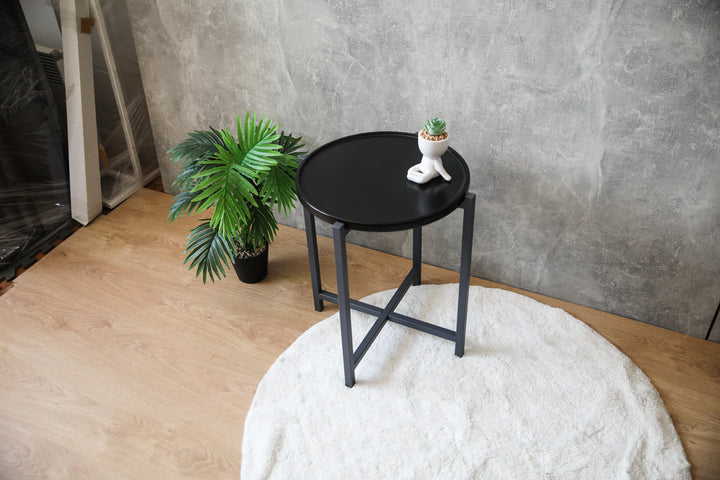 coffee-table with-a-natural-wood-top-and-black-metal-legs-perfect-for-modern-interiors