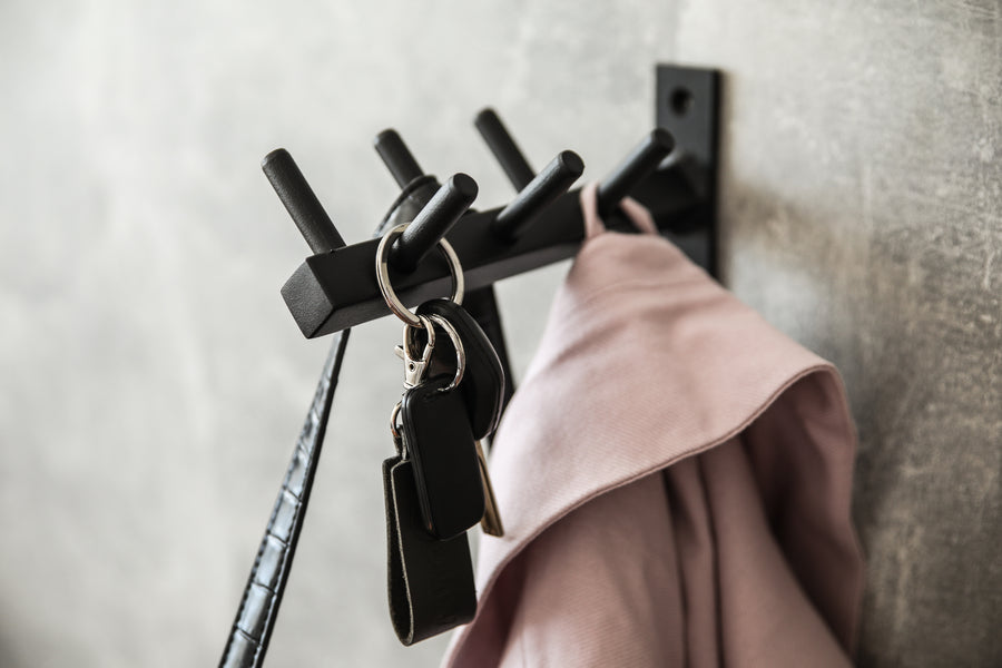 Entryway-wall-shelf-with-hooks-perfect-for-organizing-coats-bags-and-keys