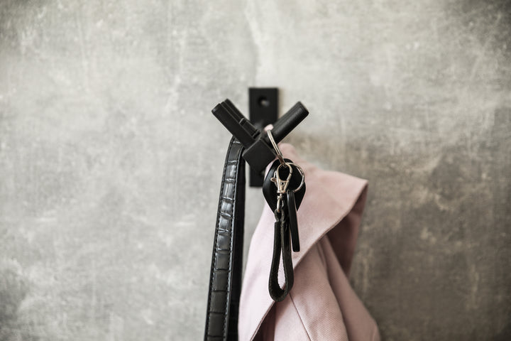 Entryway-wall-shelf-with-hooks-perfect-for-organizing-coats-bags-and-keys