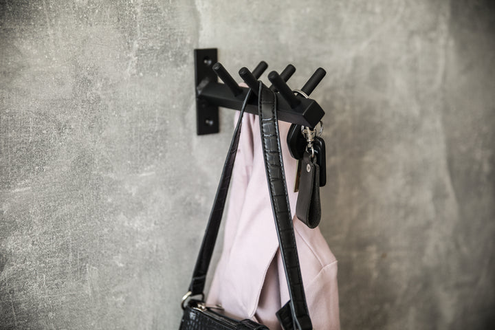 Entryway-wall-shelf-with-hooks-perfect-for-organizing-coats-bags-and-keys