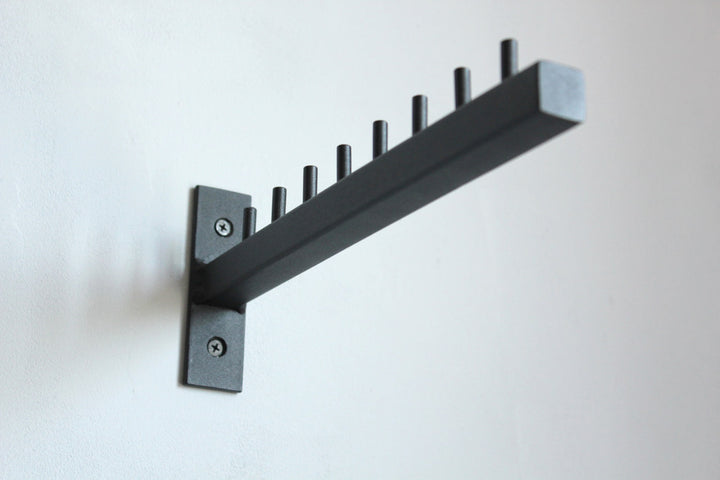 Stylish-wall-mounted-coat-hanger-with-hooks-perfect-for-modern-home-decor