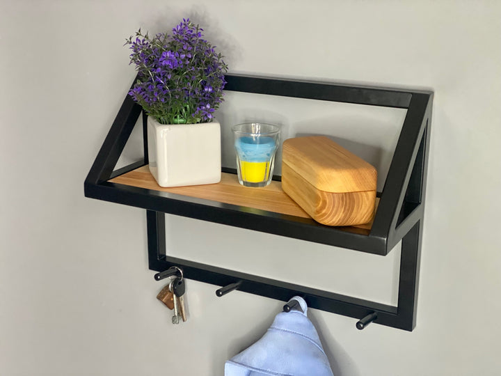 Contemporary-wall-mounted-clothes-hanger-with-a-practical-design