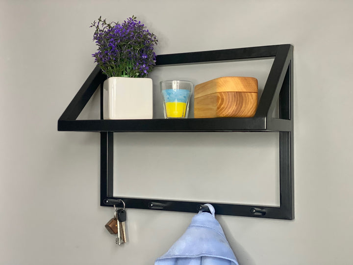 Contemporary-wall-mounted-clothes-hanger-with-a-practical-design