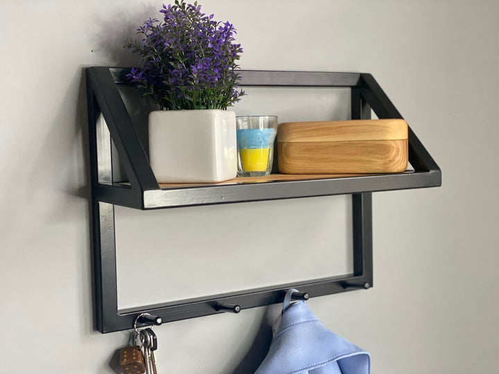 Contemporary-wall-mounted-clothes-hanger-with-a-practical-design